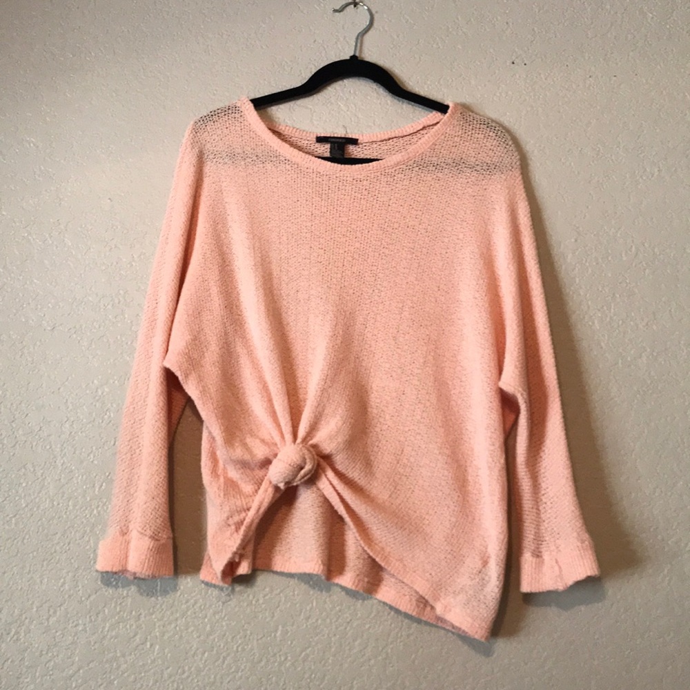 Light pink knitted sweater
